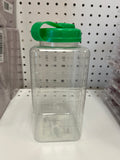 Clear plastic container with colored handle on a shelf